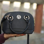 The Little Black Bag Ft. Lino Perros- Lino Perros Black Sling Bag