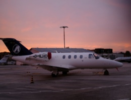 Private jet parking during sunset