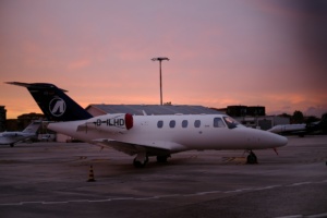 Private jet parking during sunset
