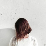 woman flaunting short hair