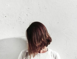 woman flaunting short hair