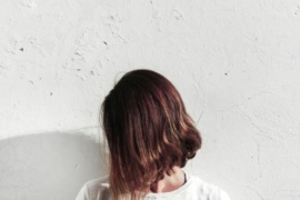 woman flaunting short hair