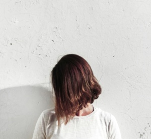 woman flaunting short hair