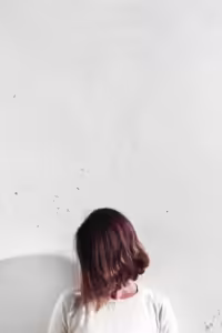 woman flaunting short hair