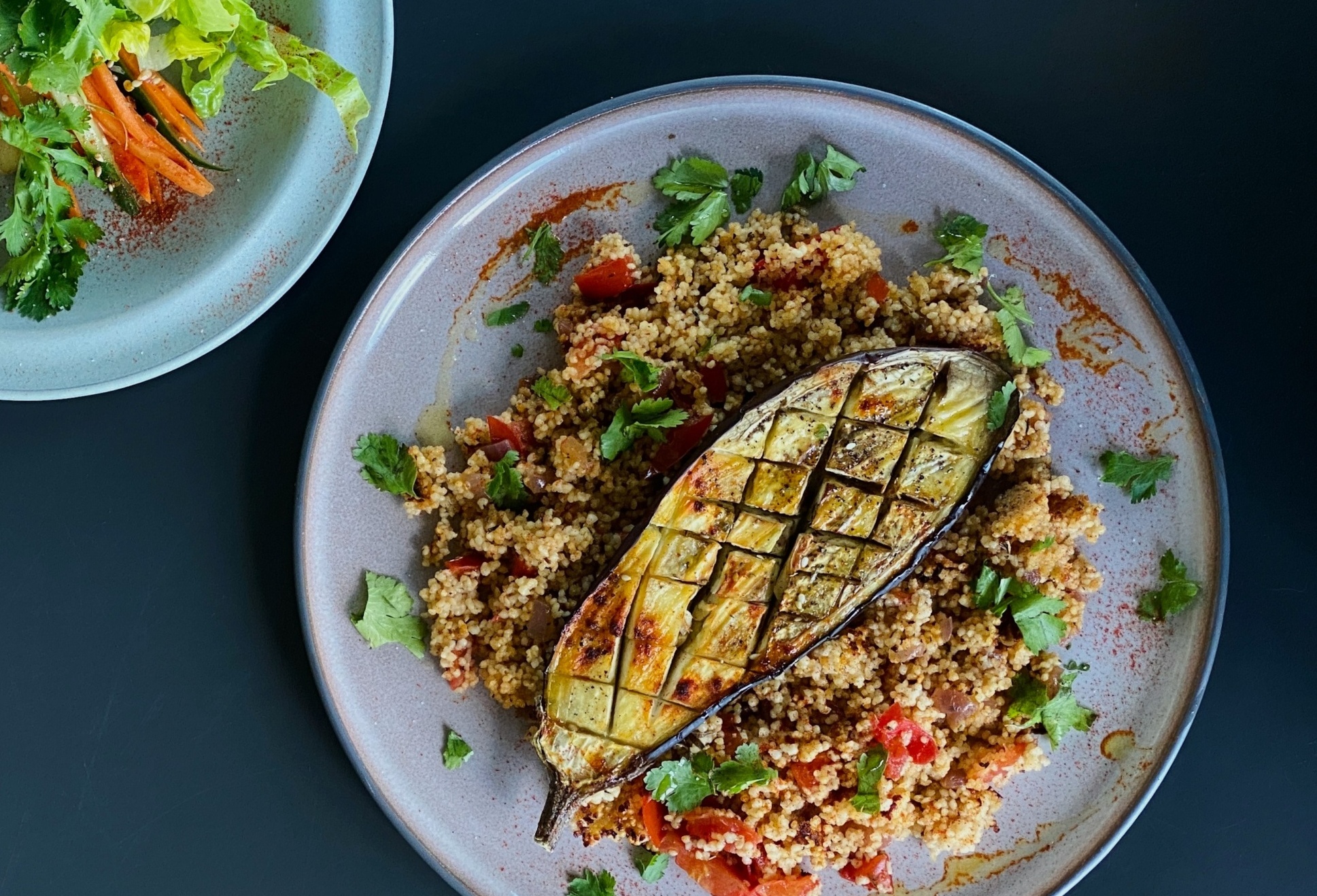 A plate of delicious quinoa lunch with veggies and brinjal