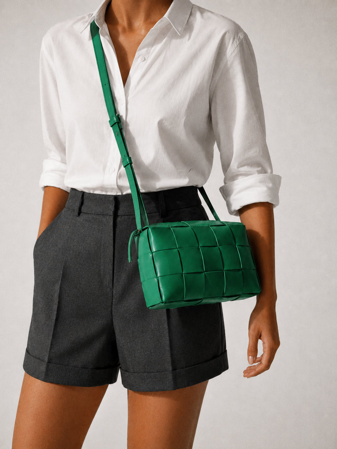 Women wearing bright green luxury sling bag